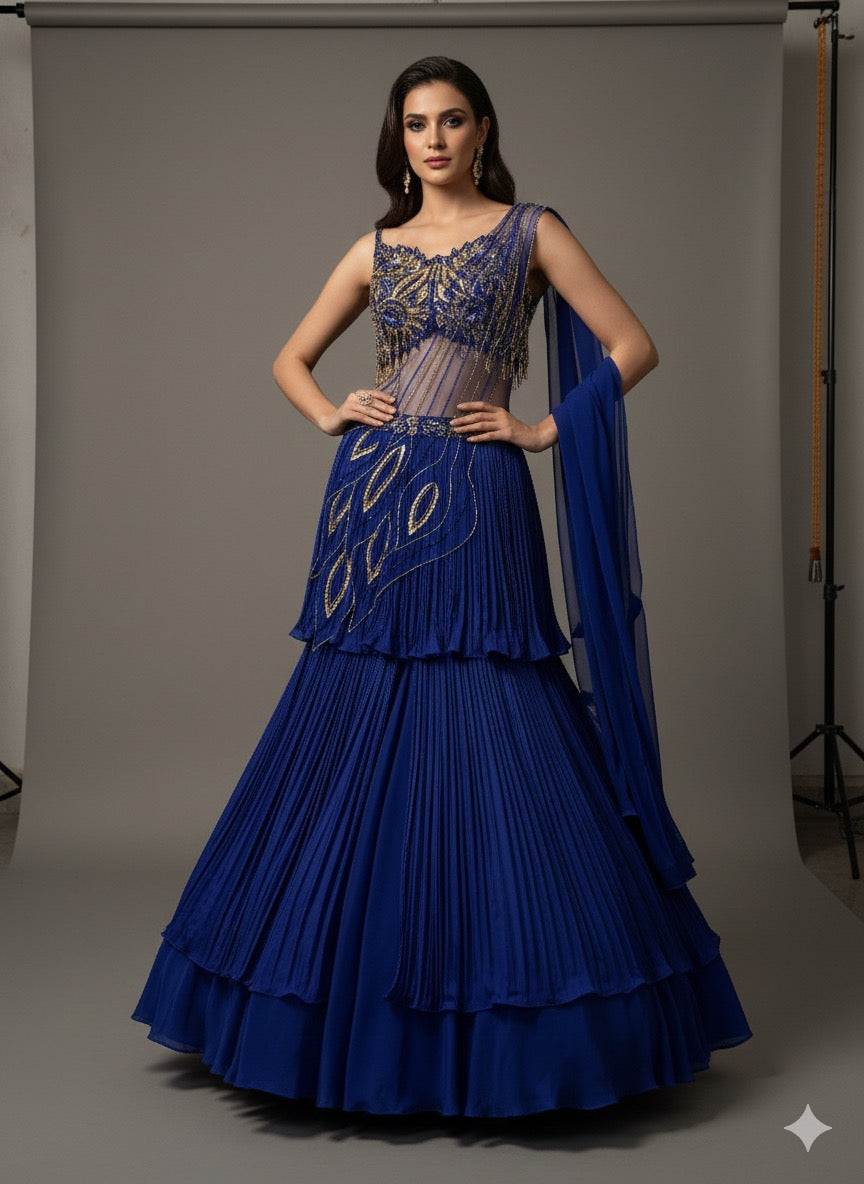 Woman wearing a blue embroidered lehenga with a matching dupatta 