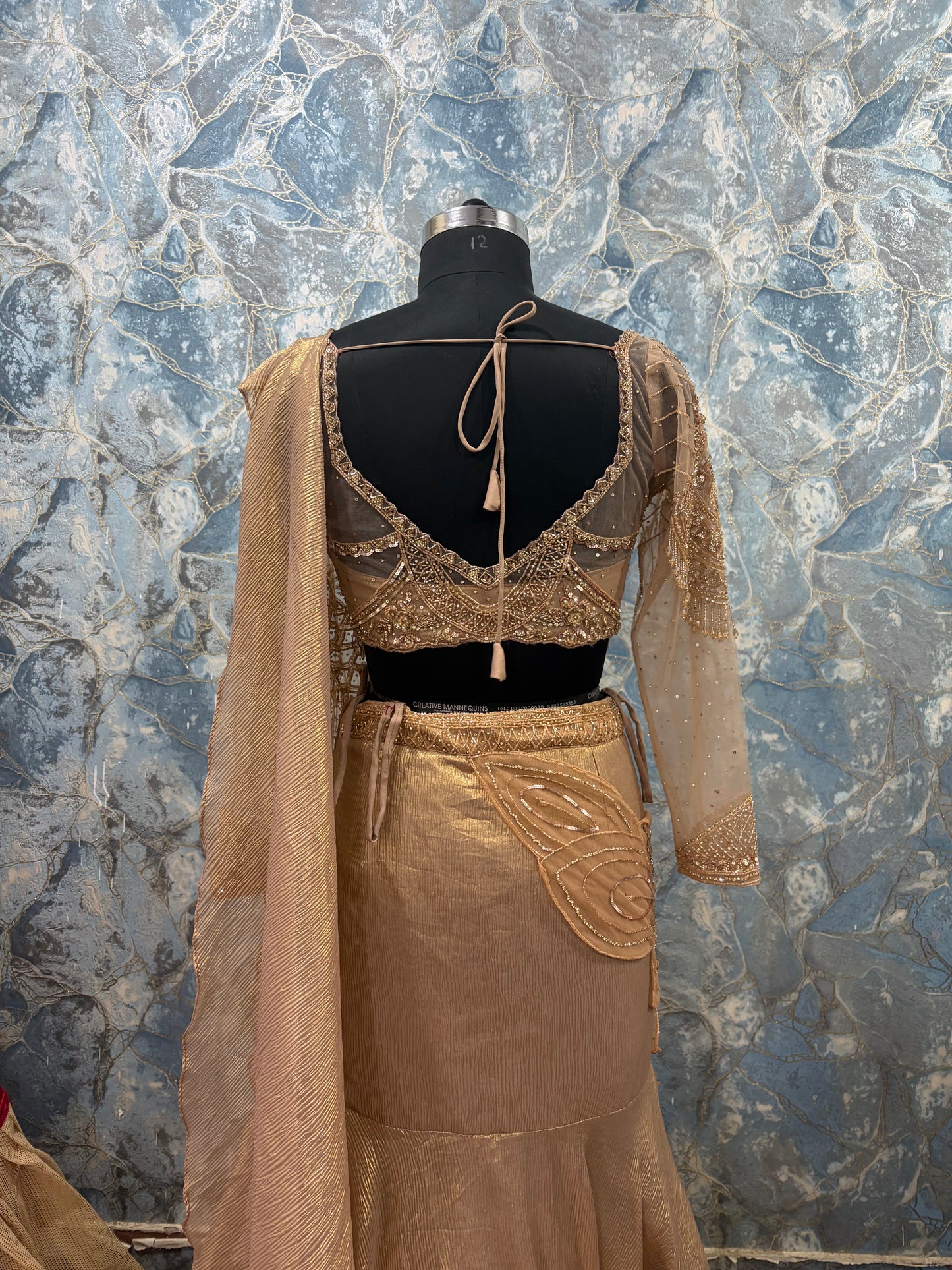 Golden Embroidered Lehenga Set with Sheer Drape & Full-Sleeve Blouse