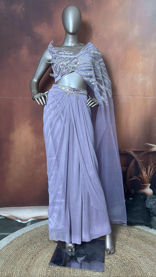 A lavender saree with a handwork  blouse